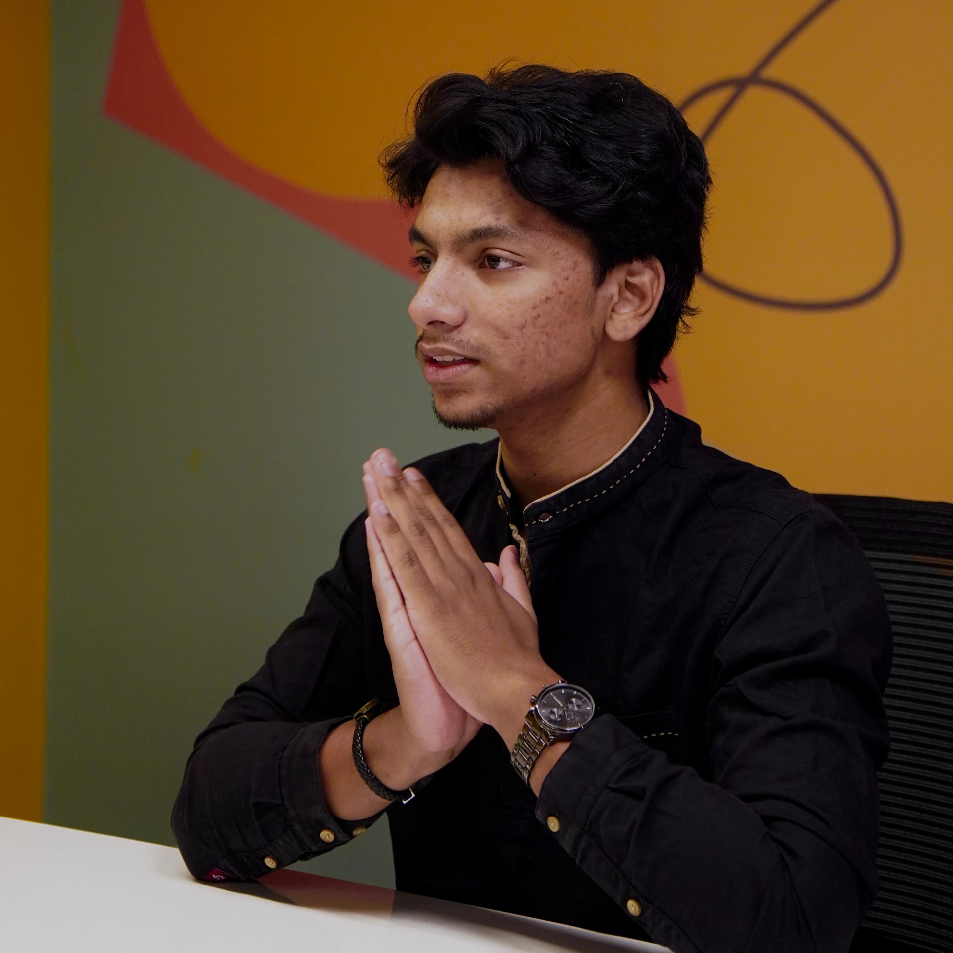 Davinus Malden Kamil, founder of AI-Phen, in conversation during a client strategy session